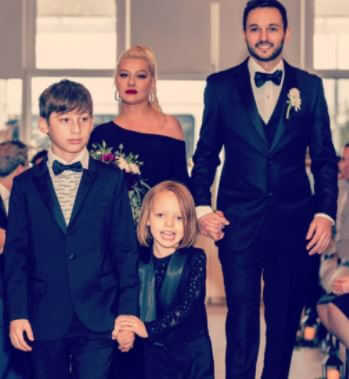 Summer Rain Rutler with her parents Christina Aguilera and Matthew Rutler and brother Max.